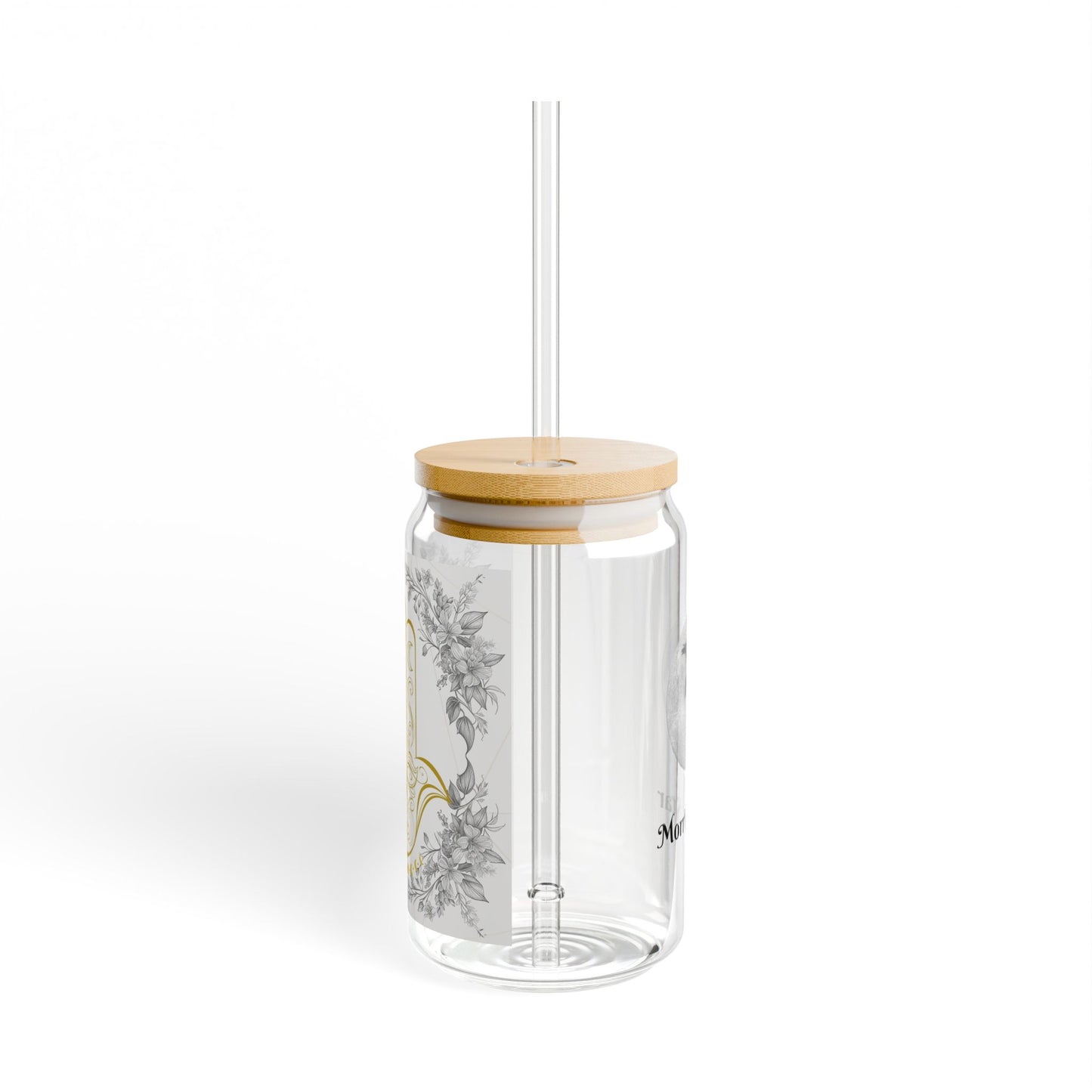 Clear glass tumbler with wooden lid and straw on a white background