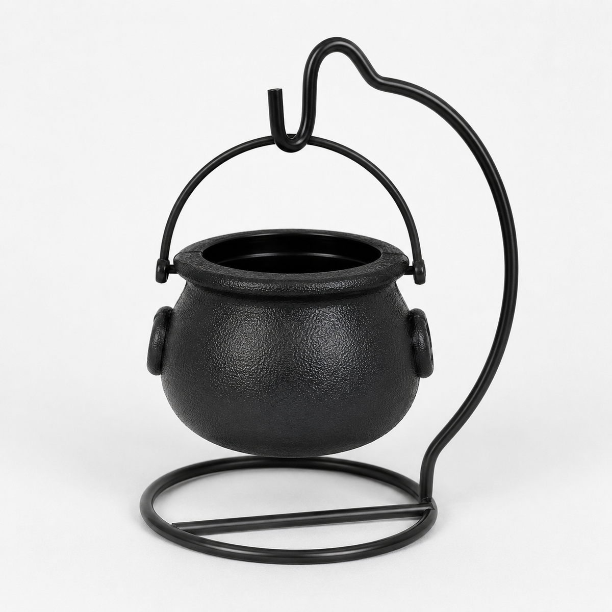Black cauldron-shaped metal candle holder with a textured finish, featuring a curved support stand and a top hanging loop, shown on a plain white background.