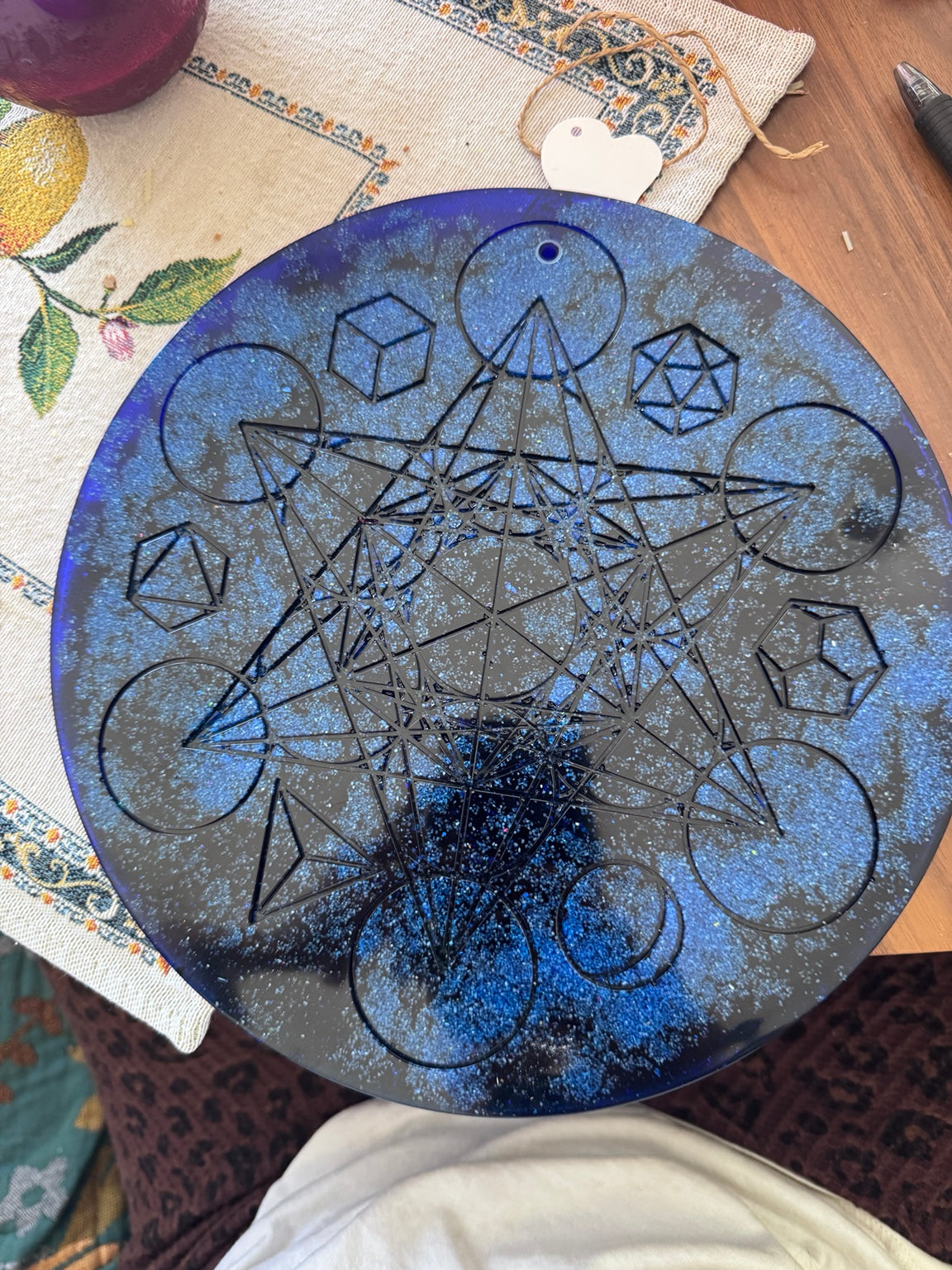 Metatron’s Cube resin altar piece during the hand-finishing process, showing the intricate sacred geometry before the final silver detailing