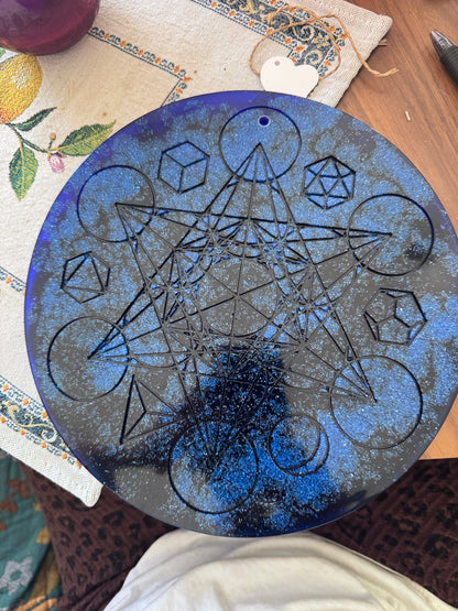 Metatron’s Cube resin altar piece during the hand-finishing process, showing the intricate sacred geometry before the final silver detailing