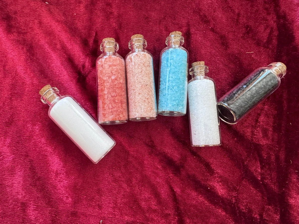 Six Morrigu Star ritual salt bottles displayed together
