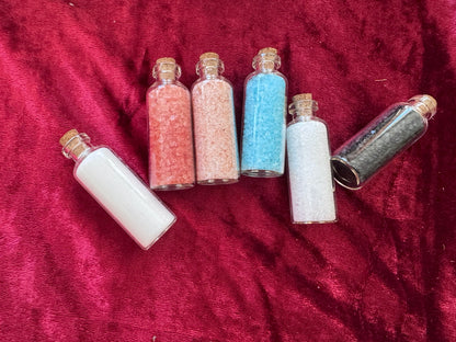 Six Morrigu Star ritual salt bottles displayed together
