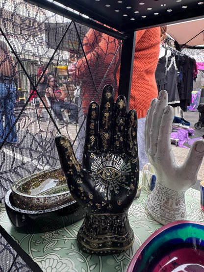 Hand-finished black palmistry hand decor with antique gold detailing by Morrigu Star